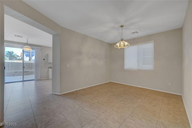 189 Paxon Hollow Ct, Las Vegas, NV 89148 - empty room featuring a chandelier and tile patterned floors
