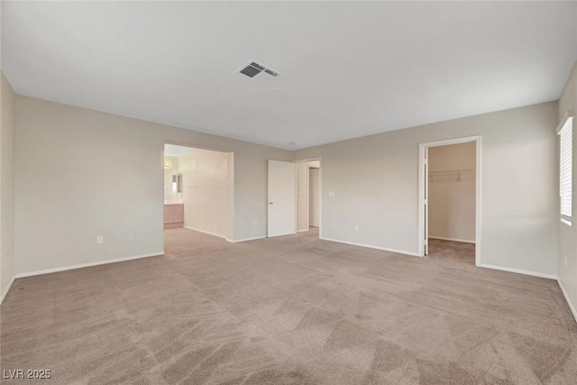 189 Paxon Hollow Ct, Las Vegas, NV 89148 - unfurnished bedroom with carpet flooring, a spacious closet, a closet, and ensuite bathroom