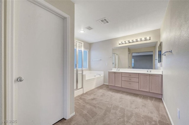 189 Paxon Hollow Ct, Las Vegas, NV 89148 - bathroom featuring double vanity, a bath, and a shower stall