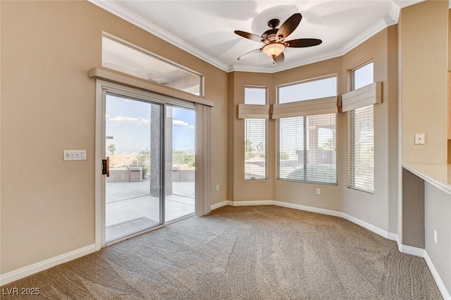 1904 Hot Oak Ridge St, Las Vegas, NV 89134 - spare room featuring carpet floors, ornamental molding, ceiling fan, and plenty of natural light