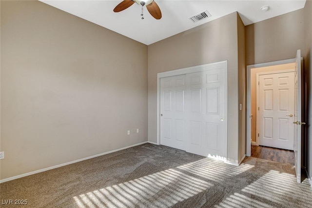 1904 Hot Oak Ridge St, Las Vegas, NV 89134 - unfurnished bedroom with carpet, a ceiling fan, and a closet
