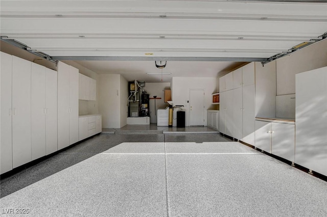 1904 Hot Oak Ridge St, Las Vegas, NV 89134 - garage featuring a garage door opener