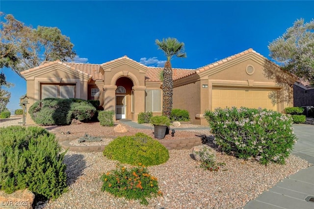 1904 Hot Oak Ridge St, Las Vegas, NV 89134 - view of front of property featuring a garage, stucco siding, and a tile roof