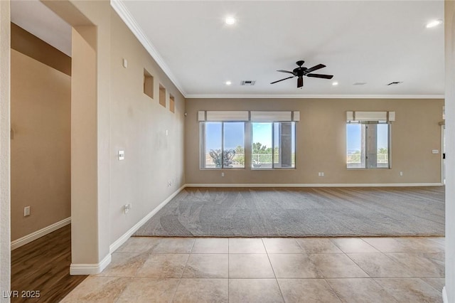 1904 Hot Oak Ridge St, Las Vegas, NV 89134 - tiled empty room with carpet flooring, ceiling fan, ornamental molding, and recessed lighting
