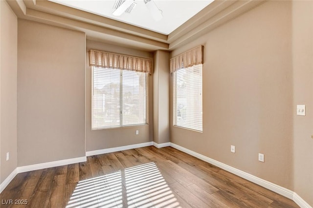 1904 Hot Oak Ridge St, Las Vegas, NV 89134 - spare room featuring wood finished floors and a raised ceiling