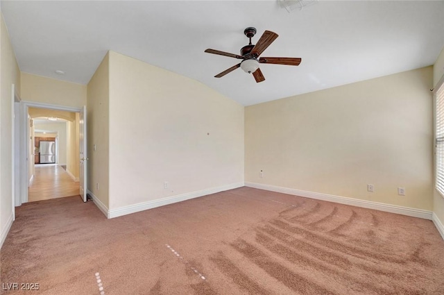 4841 Raw Umber Ct, Las Vegas, NV 89131 - empty room featuring a ceiling fan, light colored carpet, and lofted ceiling