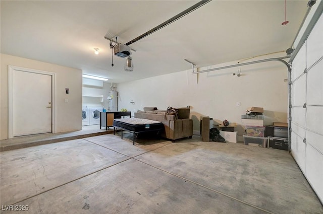 4841 Raw Umber Ct, Las Vegas, NV 89131 - garage with washing machine and clothes dryer, strapped water heater, and a garage door opener