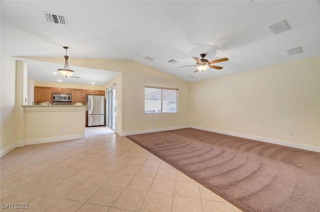4841 Raw Umber Ct, Las Vegas, NV 89131 - unfurnished living room featuring lofted ceiling, a ceiling fan, and light tile patterned floors