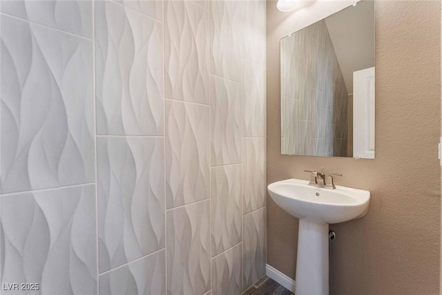 9850 Poplar Point Ave, Las Vegas, NV 89178 - bathroom with a sink and a shower