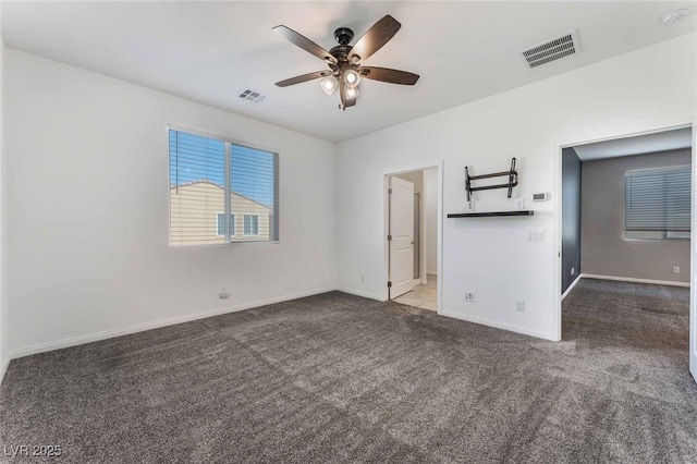 9850 Poplar Point Ave, Las Vegas, NV 89178 - empty room with a ceiling fan, carpet floors, and a smoke detector