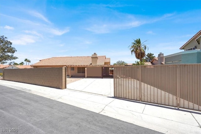 1613 Glenrosa Dr, North Las Vegas, NV 89031 - single story home with a tile roof and stucco siding