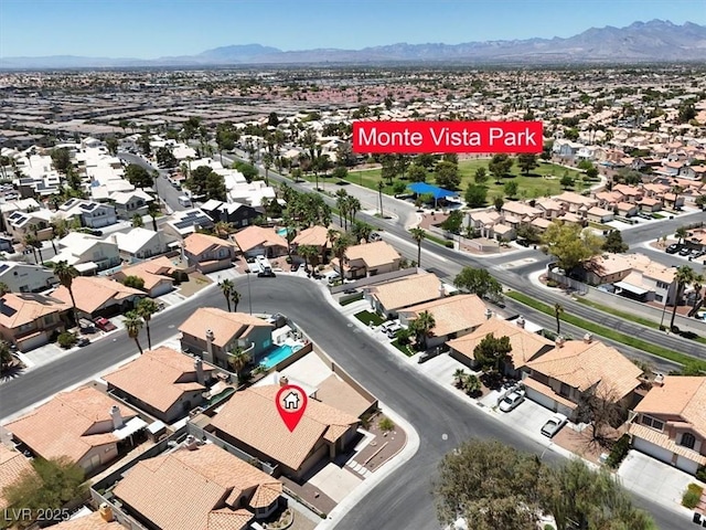 1613 Glenrosa Dr, North Las Vegas, NV 89031 - aerial view of residential area with a mountain backdrop