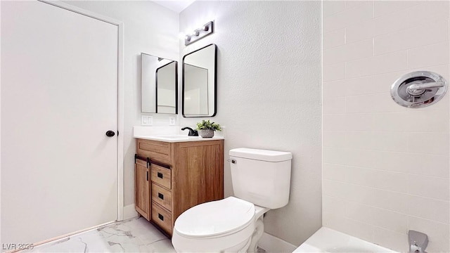 744 Hubbard St, Las Vegas, NV 89110 - bathroom featuring marble finish floors, vanity, and a shower