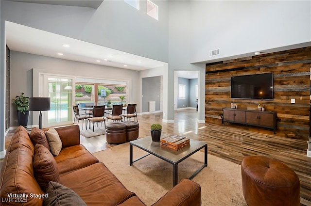 209 Camino Vista St, Henderson, NV 89012 - living area with light wood finished floors, recessed lighting, and a towering ceiling