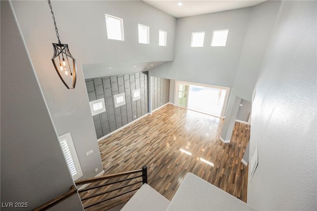 209 Camino Vista St, Henderson, NV 89012 - unfurnished living room featuring a high ceiling and wood finished floors