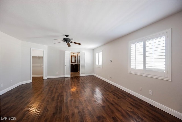 209 Camino Vista St, Henderson, NV 89012 - unfurnished living room with ceiling fan, dark wood finished floors, and a fireplace