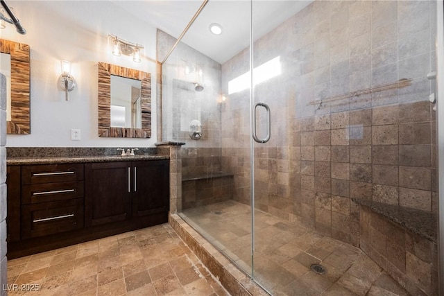 209 Camino Vista St, Henderson, NV 89012 - bathroom with vanity, a shower stall, recessed lighting, and stone finish flooring