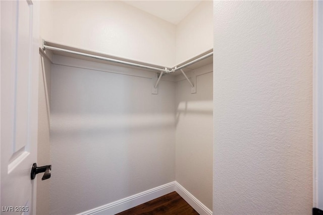 209 Camino Vista St, Henderson, NV 89012 - walk in closet featuring dark wood-type flooring