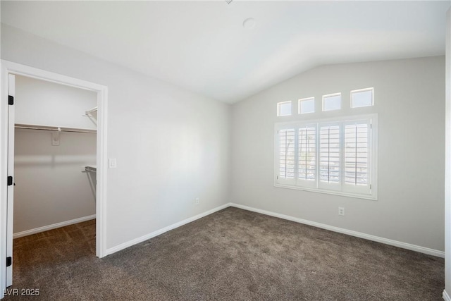 209 Camino Vista St, Henderson, NV 89012 - unfurnished bedroom featuring vaulted ceiling, carpet, a walk in closet, and a closet