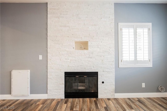 209 Camino Vista St, Henderson, NV 89012 - detailed view of wood finished floors and a fireplace