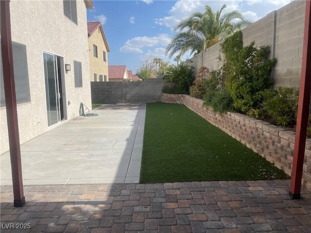 6043 Cape Clairmont Ct, North Las Vegas, NV 89031 - fenced backyard featuring a patio