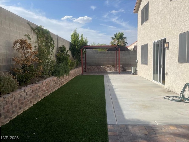 6043 Cape Clairmont Ct, North Las Vegas, NV 89031 - fenced backyard featuring a patio