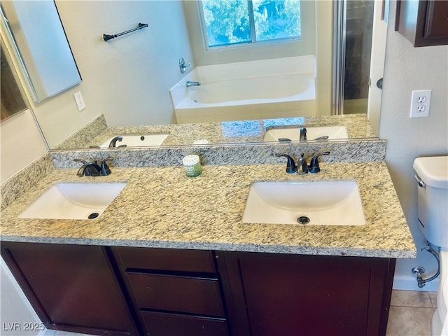 6043 Cape Clairmont Ct, North Las Vegas, NV 89031 - bathroom with double vanity and a garden tub