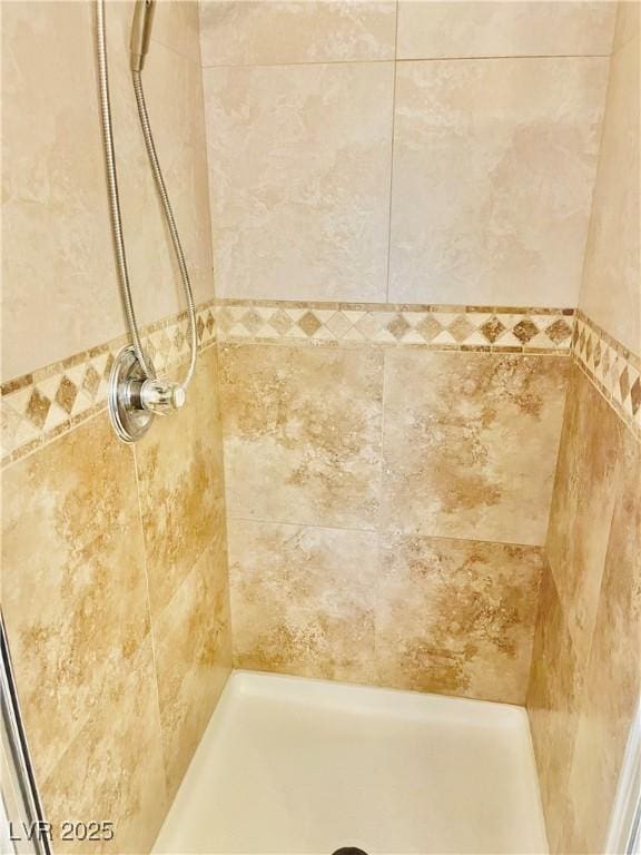 6043 Cape Clairmont Ct, North Las Vegas, NV 89031 - full bath with a tile shower