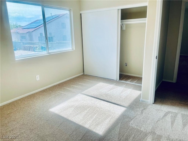6043 Cape Clairmont Ct, North Las Vegas, NV 89031 - unfurnished bedroom featuring carpet and a closet