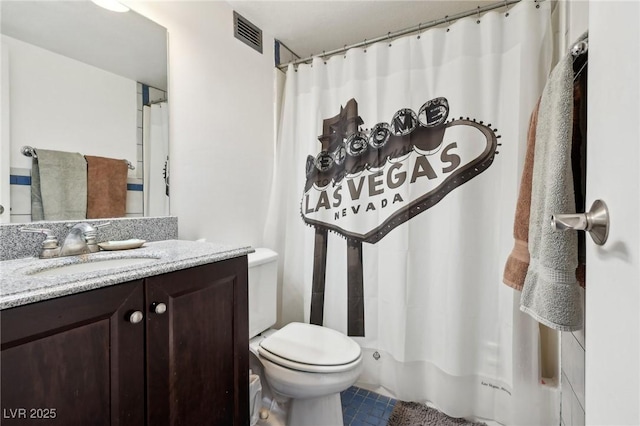 3930 University Center Dr Unit 804, Las Vegas, NV 89119 - bathroom featuring vanity, tile patterned floors, and a shower with curtain