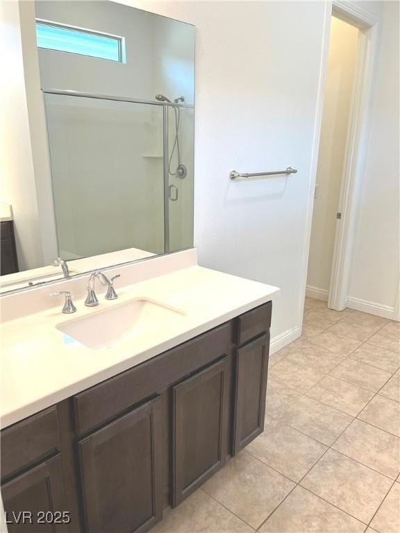 8550 Lost Pony St, Las Vegas, NV 89148 - bathroom featuring vanity, a shower, and tile patterned flooring