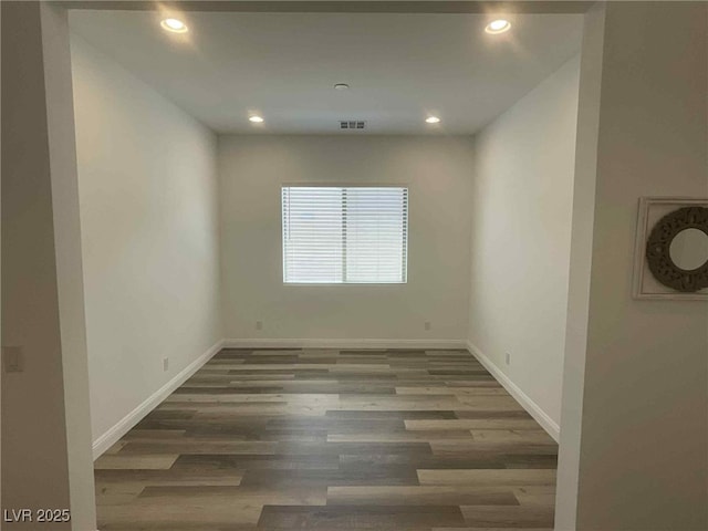 8550 Lost Pony St, Las Vegas, NV 89148 - unfurnished room featuring wood finished floors and recessed lighting