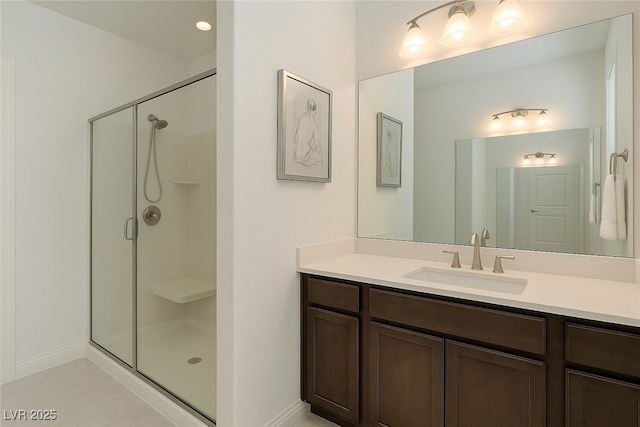 8550 Lost Pony St, Las Vegas, NV 89148 - bathroom featuring a stall shower, vanity, and tile patterned flooring