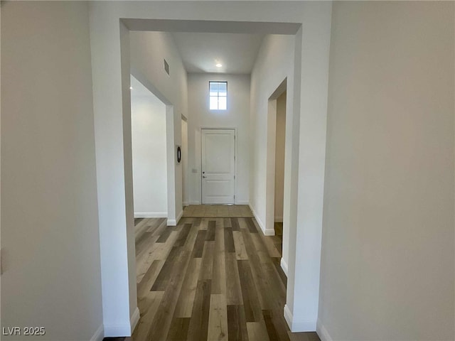 8550 Lost Pony St, Las Vegas, NV 89148 - corridor featuring wood finished floors and baseboards