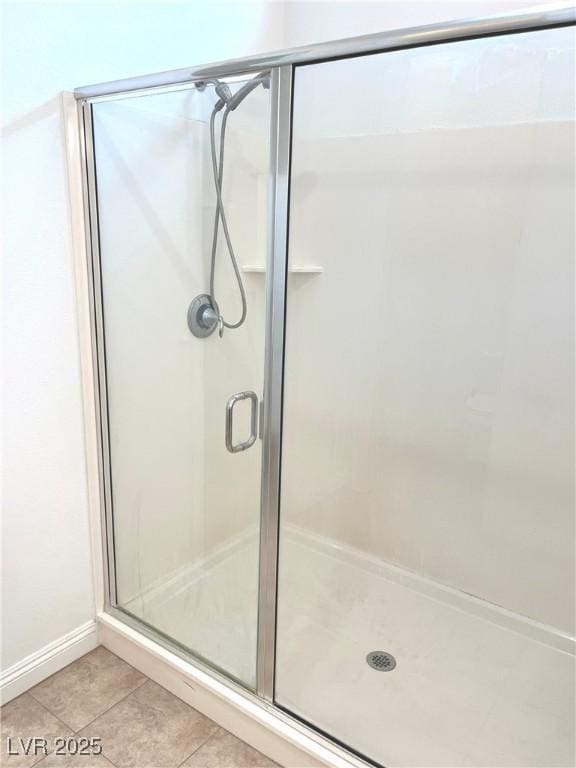 8550 Lost Pony St, Las Vegas, NV 89148 - bathroom with a stall shower and tile patterned flooring