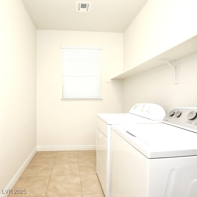 8550 Lost Pony St, Las Vegas, NV 89148 - washroom with washing machine and dryer and light tile patterned floors