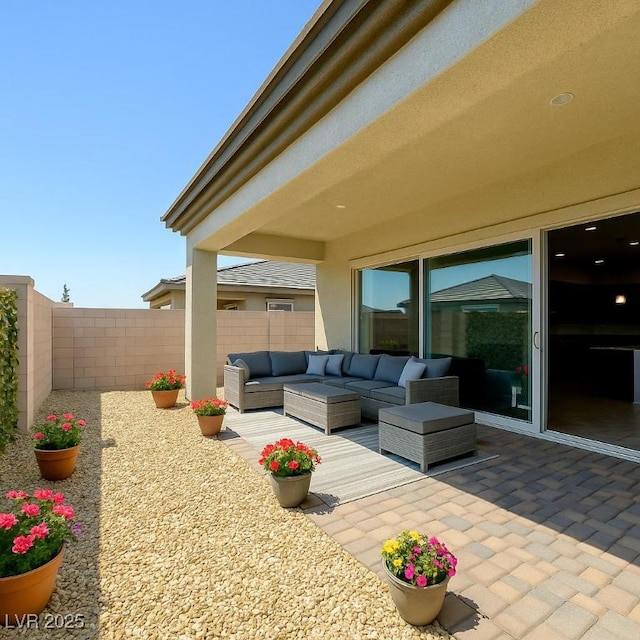 8550 Lost Pony St, Las Vegas, NV 89148 - fenced backyard with an outdoor hangout area and a patio area