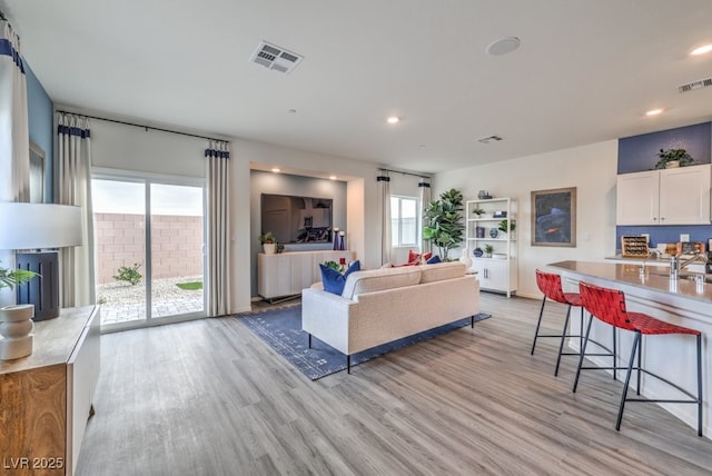 7965 Aurora Sky St Unit 623, North Las Vegas, NV 89084 - living area with light wood-style flooring and recessed lighting