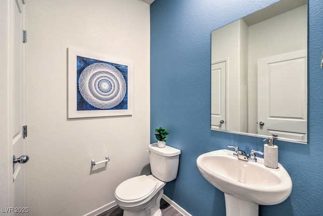 7965 Aurora Sky St Unit 623, North Las Vegas, NV 89084 - half bath with a sink and wood finished floors