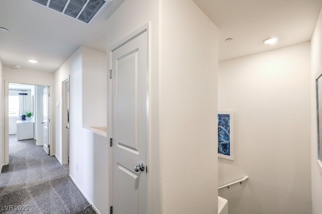 7965 Aurora Sky St Unit 623, North Las Vegas, NV 89084 - hallway with carpet flooring and baseboards