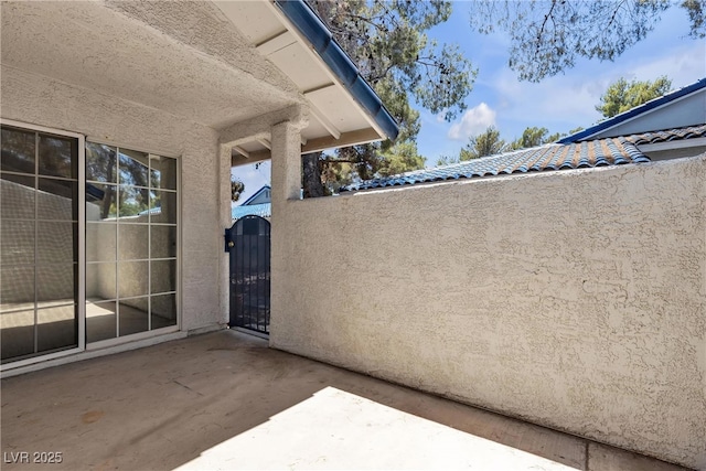 2124 Willowbury Dr Unit D, Las Vegas, NV 89108 - view of patio / terrace featuring a gate
