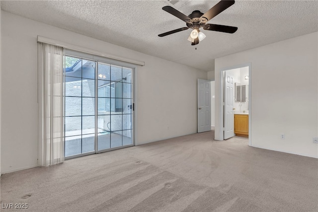2124 Willowbury Dr Unit D, Las Vegas, NV 89108 - spare room featuring light carpet, a textured ceiling, and ceiling fan