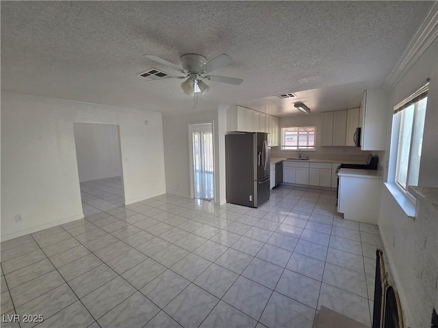 6402 Agua Dr, Las Vegas, NV 89103 - unfurnished living room featuring light tile patterned flooring, crown molding, ceiling fan, and a textured ceiling