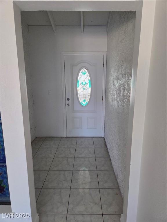 6402 Agua Dr, Las Vegas, NV 89103 - foyer entrance with light tile patterned floors