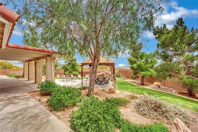 9180 Mohawk St, Las Vegas, NV 89139 - fenced backyard featuring a gazebo and a patio