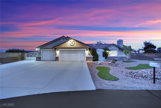 9180 Mohawk St, Las Vegas, NV 89139 - single story home featuring driveway, an attached garage, and a chimney