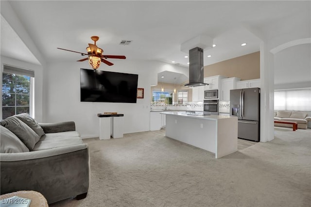 9180 Mohawk St, Las Vegas, NV 89139 - living area featuring light carpet, recessed lighting, and a ceiling fan