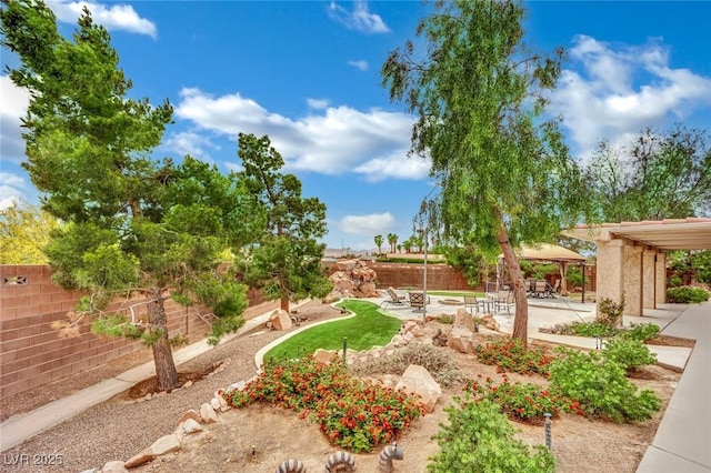 9180 Mohawk St, Las Vegas, NV 89139 - fenced backyard featuring a patio area