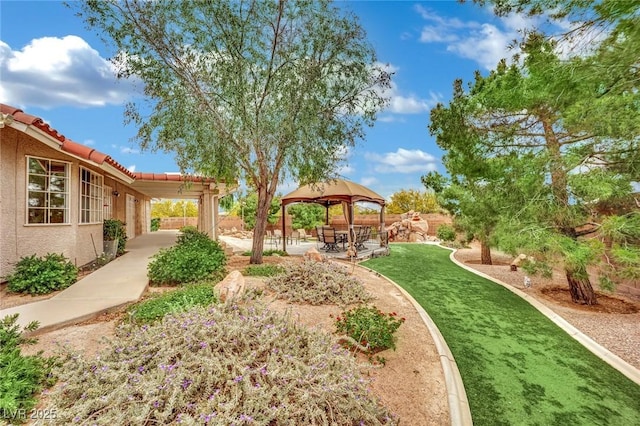 9180 Mohawk St, Las Vegas, NV 89139 - view of yard with a gazebo and a patio area