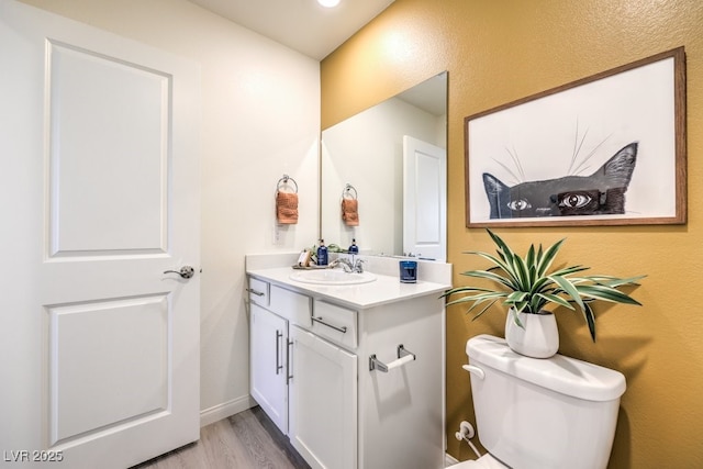 5702 Sunset Sedona St Lot 2, North Las Vegas, NV 89081 - half bathroom featuring vanity and wood finished floors